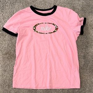 Nike Pink Tee with Floral Logo and Black Trim